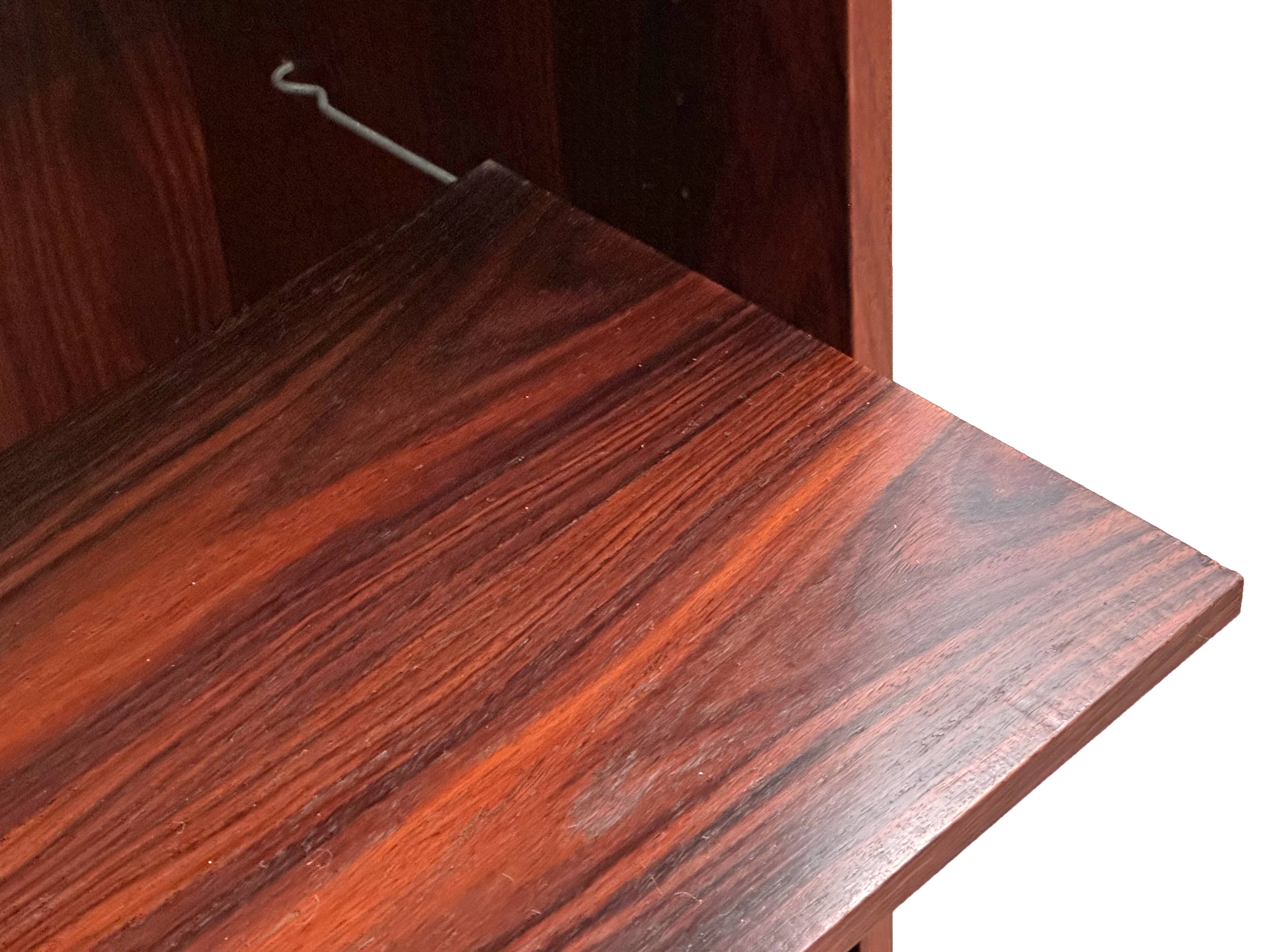 Scandinavian library in rosewood designed by Ib Kofod Larsen.