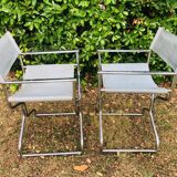 Pair of folding metal and leather armchairs