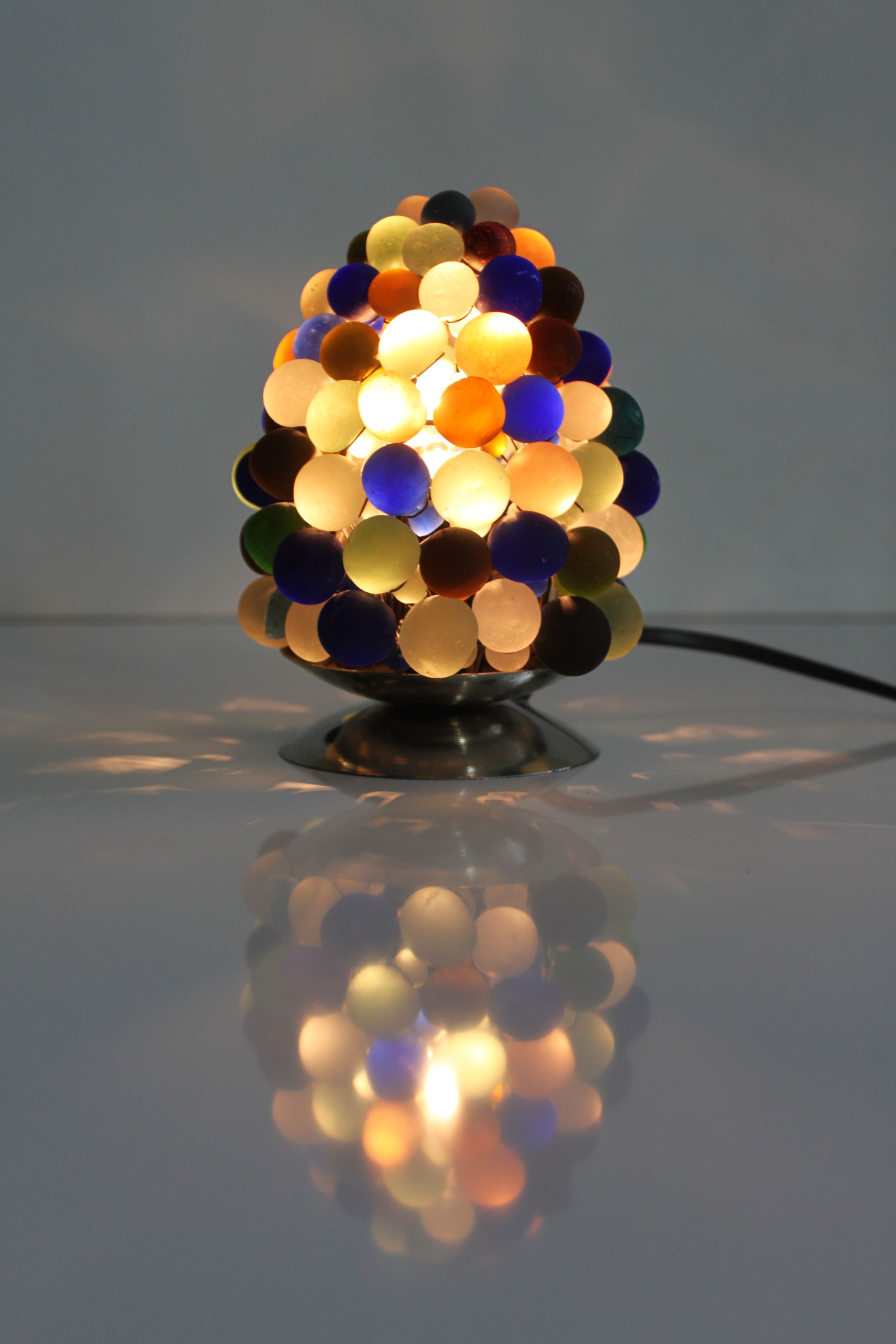 Night light in bunch of grapes, Italy.