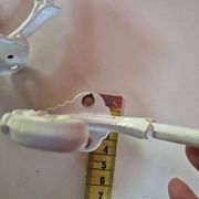 set of 2 vintage white cast iron hooks, small paint chips from the year