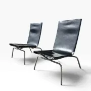 Set of 2 Crossed Legged lounge chairs by Fabiaan van Severen.