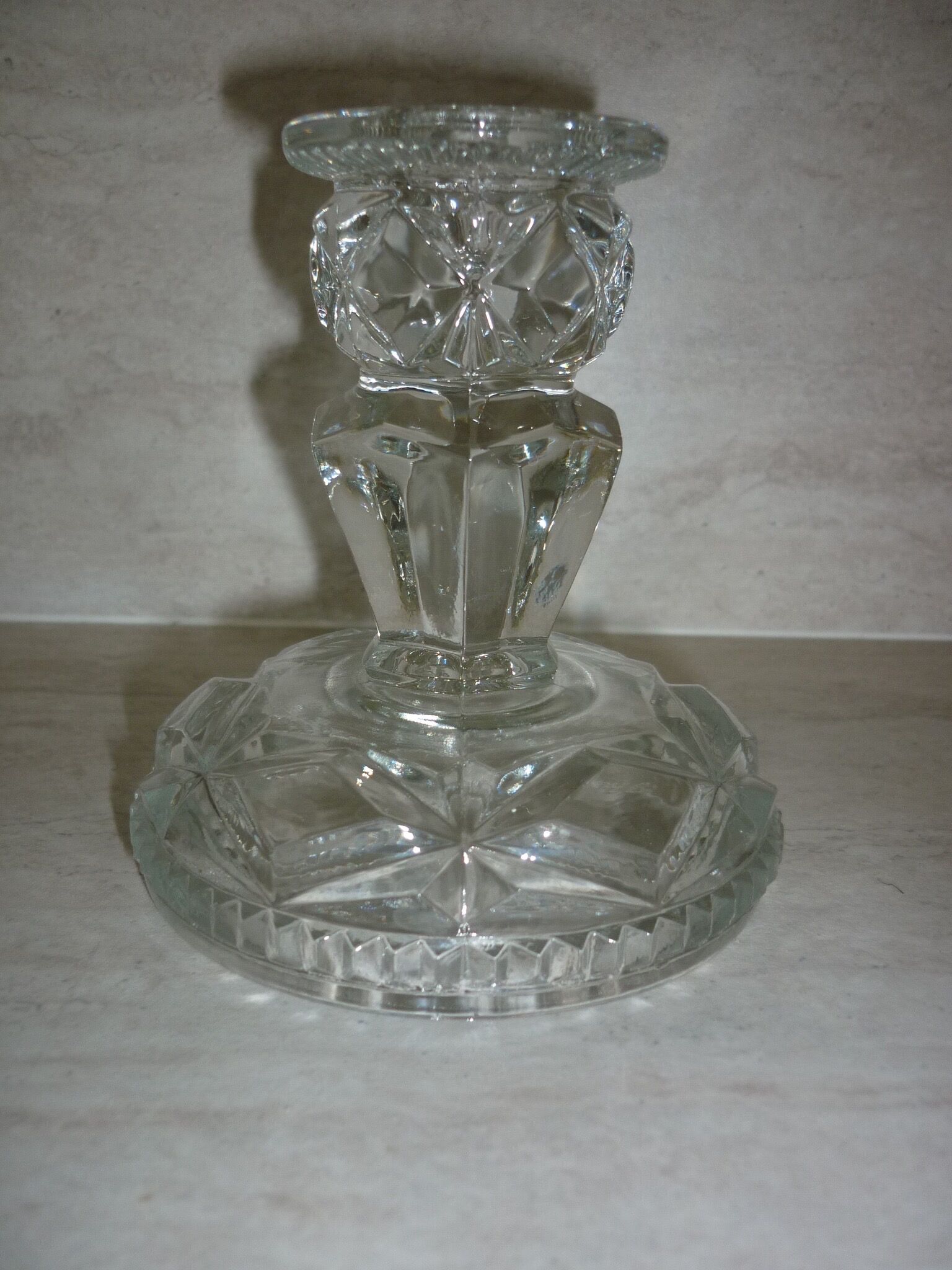 Chiseled pressed glass candle holder