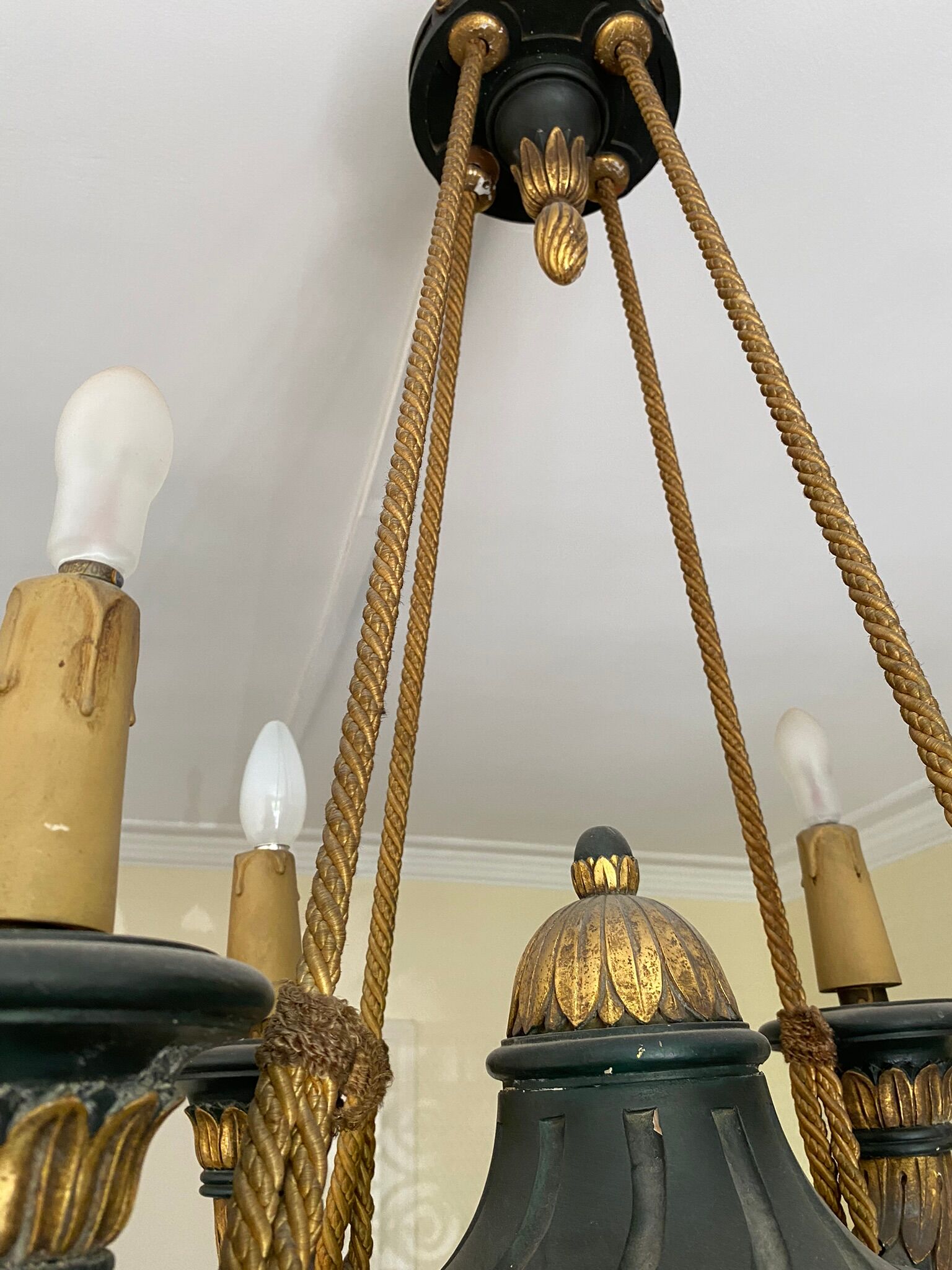 Empire style chandelier with four lights in sheet metal, bronze with patina and gilding