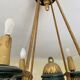 Empire style chandelier with four lights in sheet metal, bronze with patina and gilding