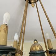 Empire style chandelier with four lights in sheet metal, bronze with patina and gilding