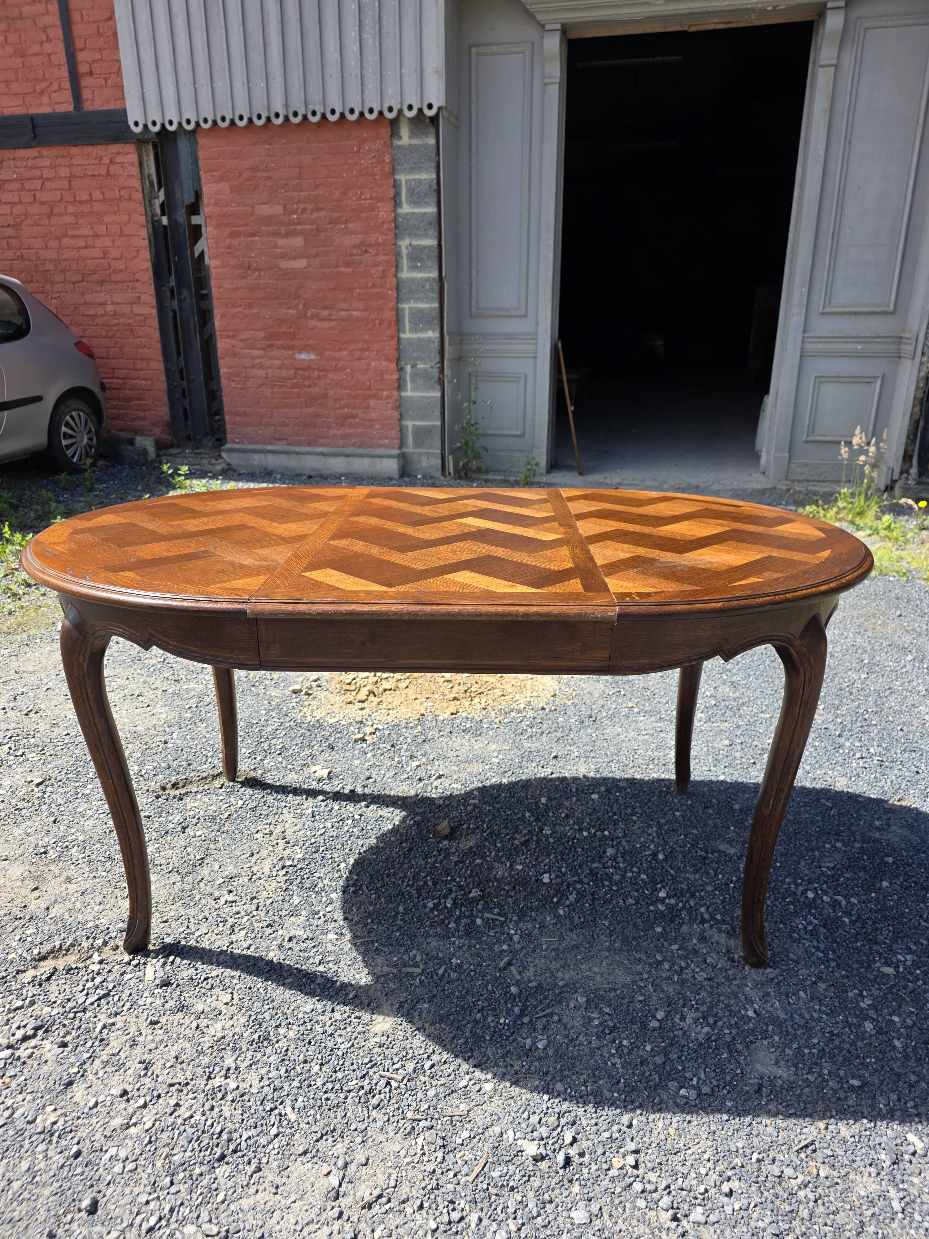Extendable table in Louis XV style in oak (2 extensions)