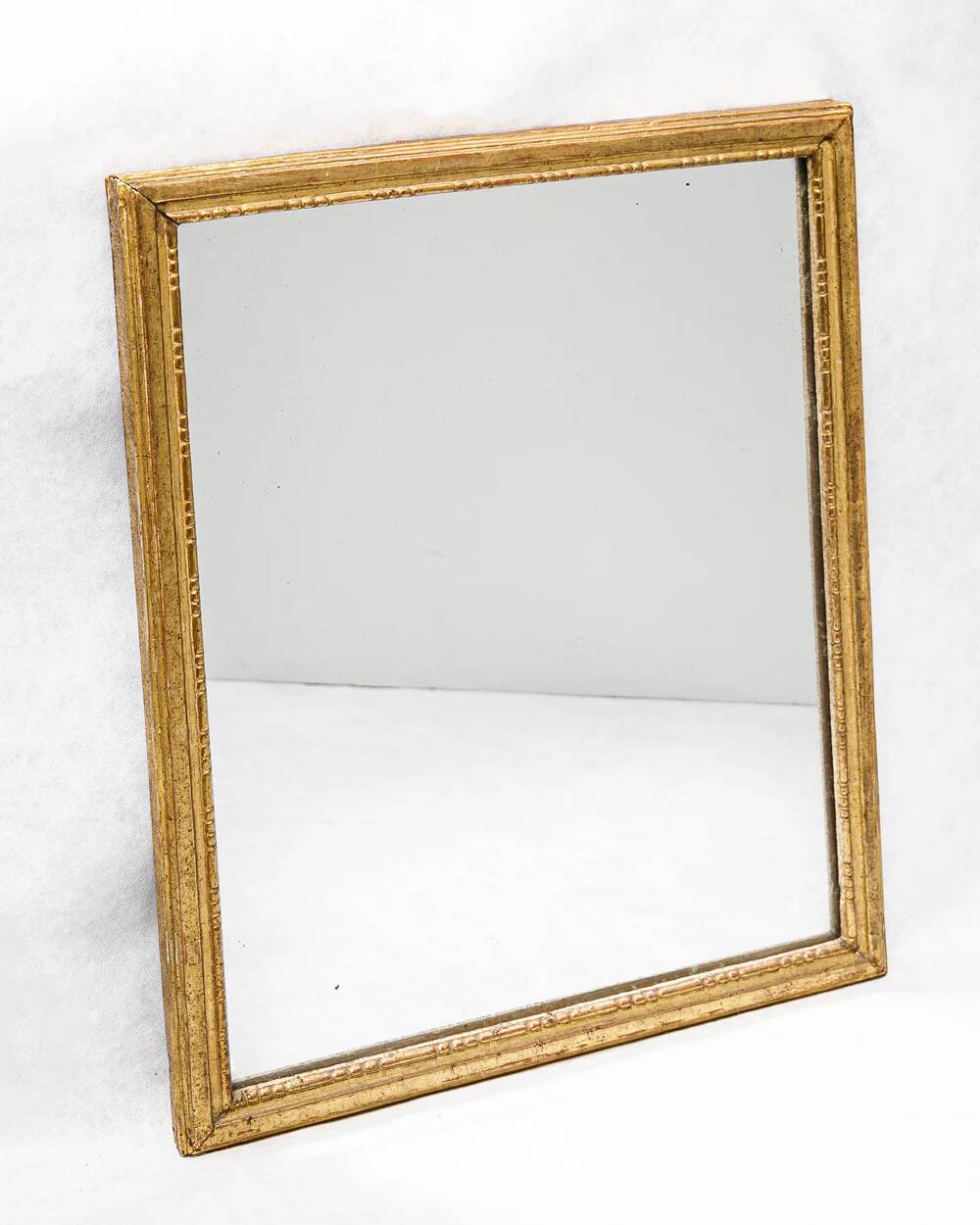 Small Louis XVI giltwood "square" mirror
