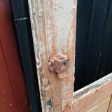 Ancient paneled solid oak door with 3 windows
