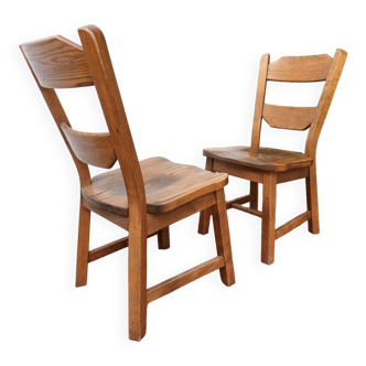 Set of 4 brutalist chalet-style oak chairs