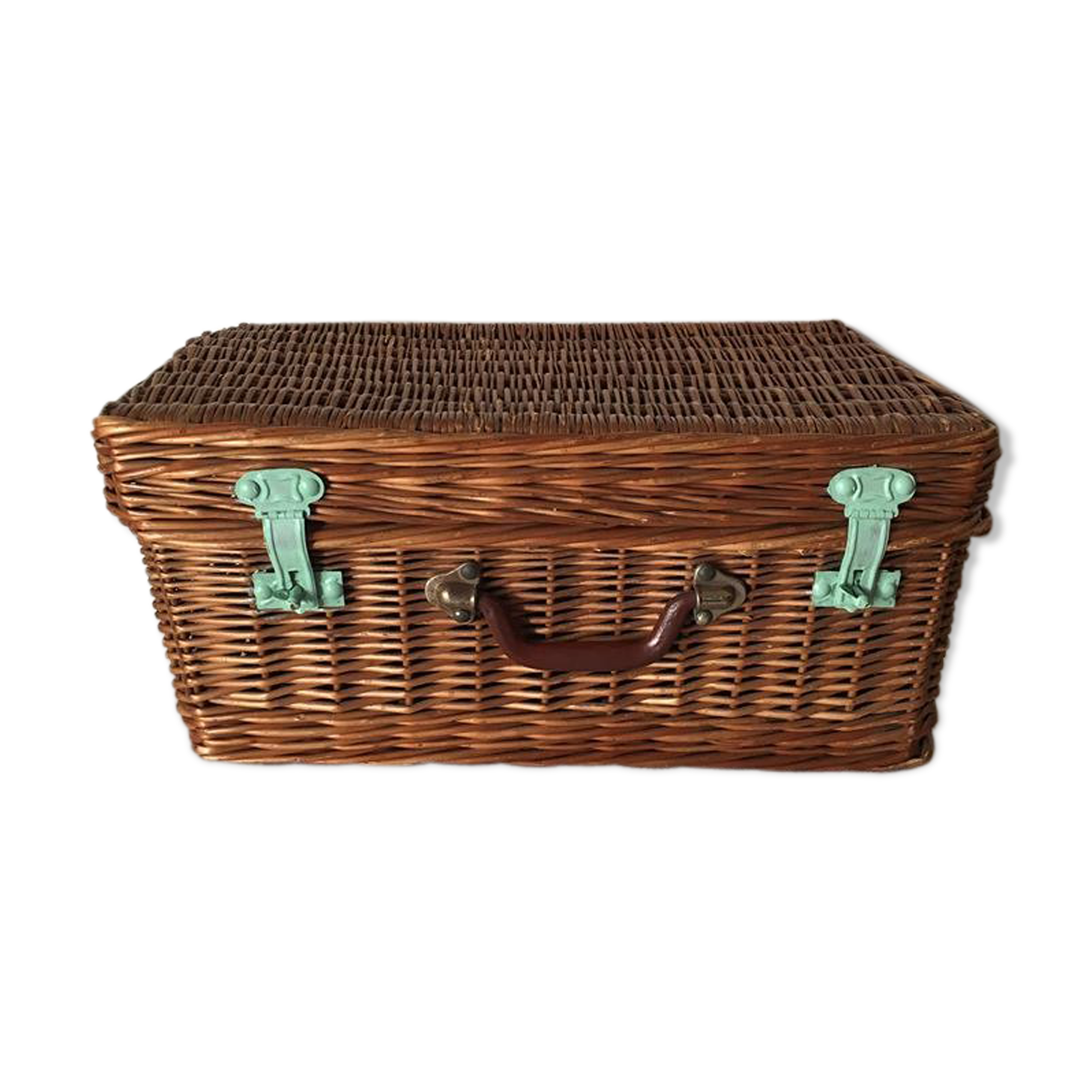 Wicker suitcase to store toys.