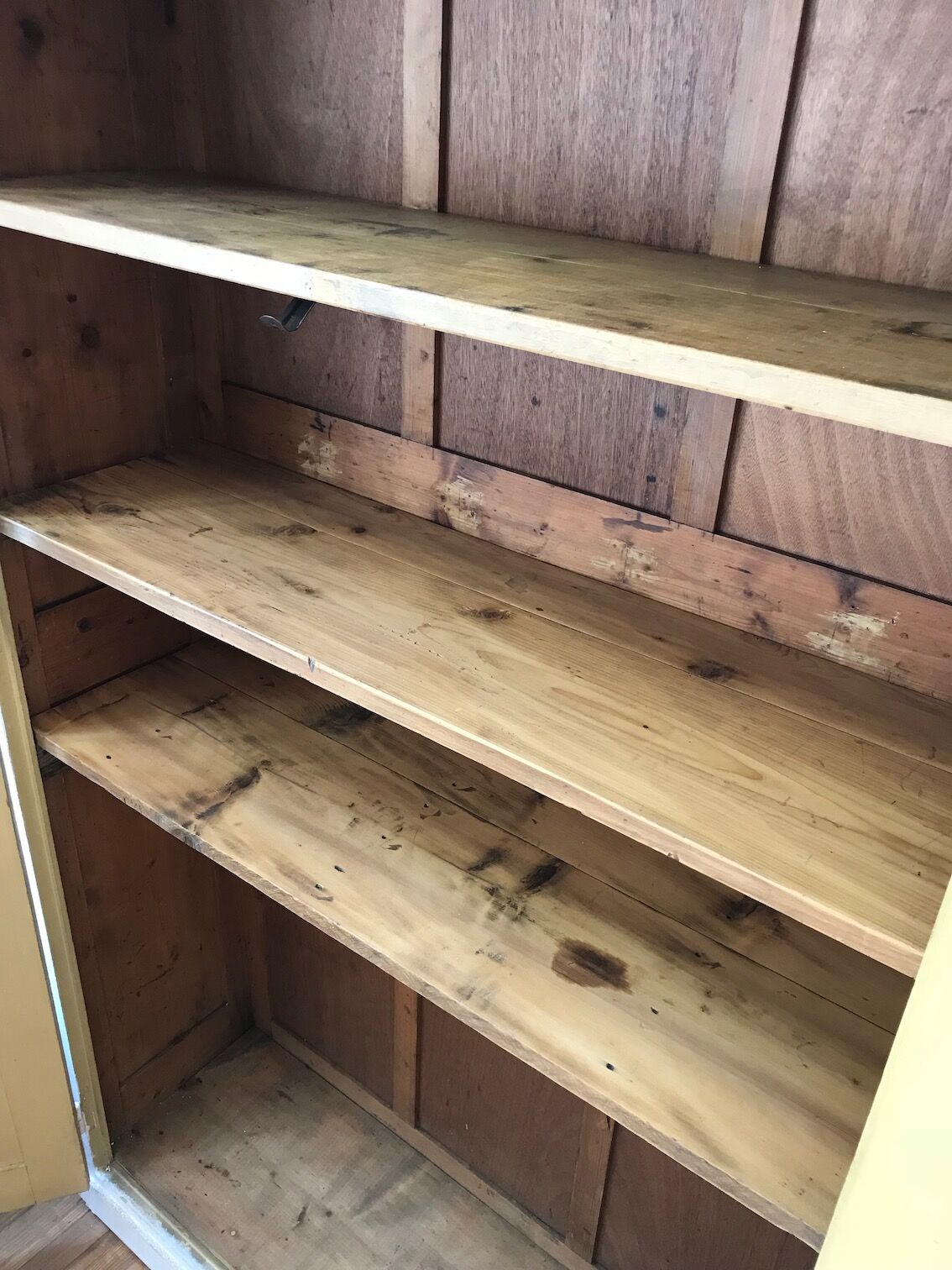 Antique wardrobe in patinated pine