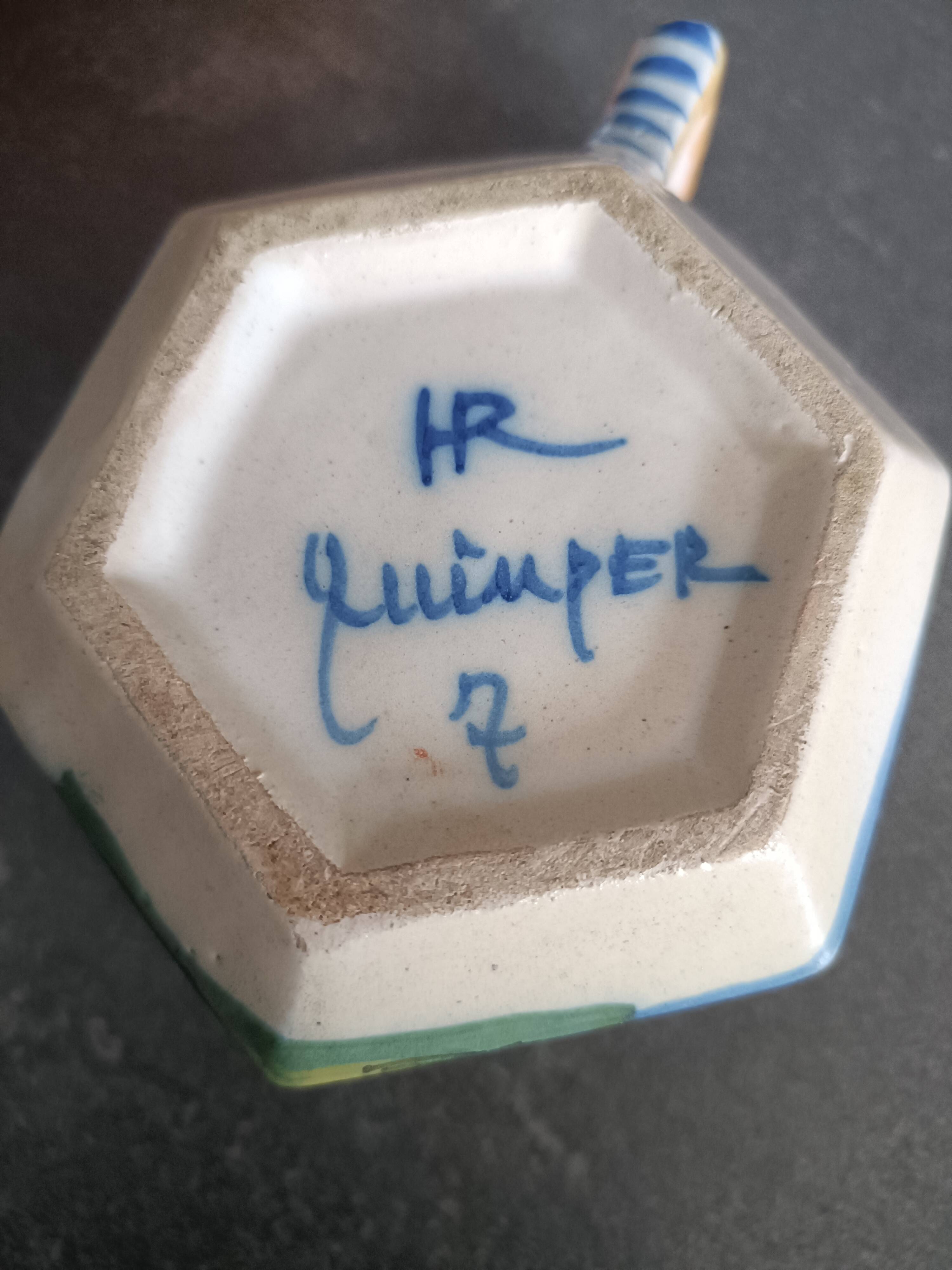Hexagonal cup signed Henriot HR Quimper 7. Good condition.