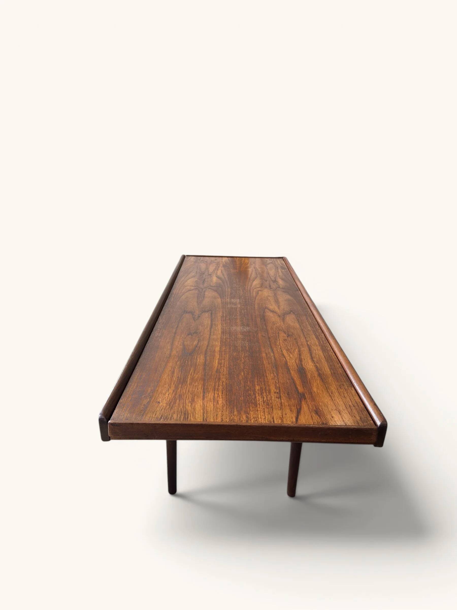 Vintage teak coffee table with a reversible top.
