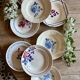 Set of 8 mismatched vintage soup plates
