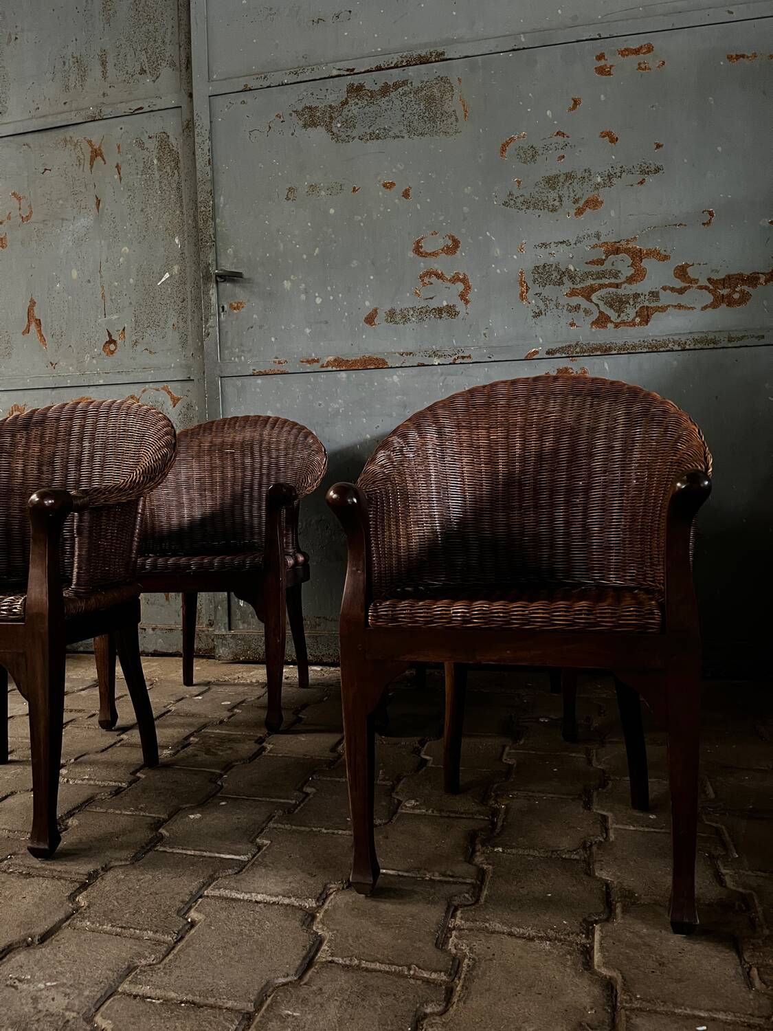 Arm chairs in dark rattan