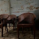 Arm chairs in dark rattan