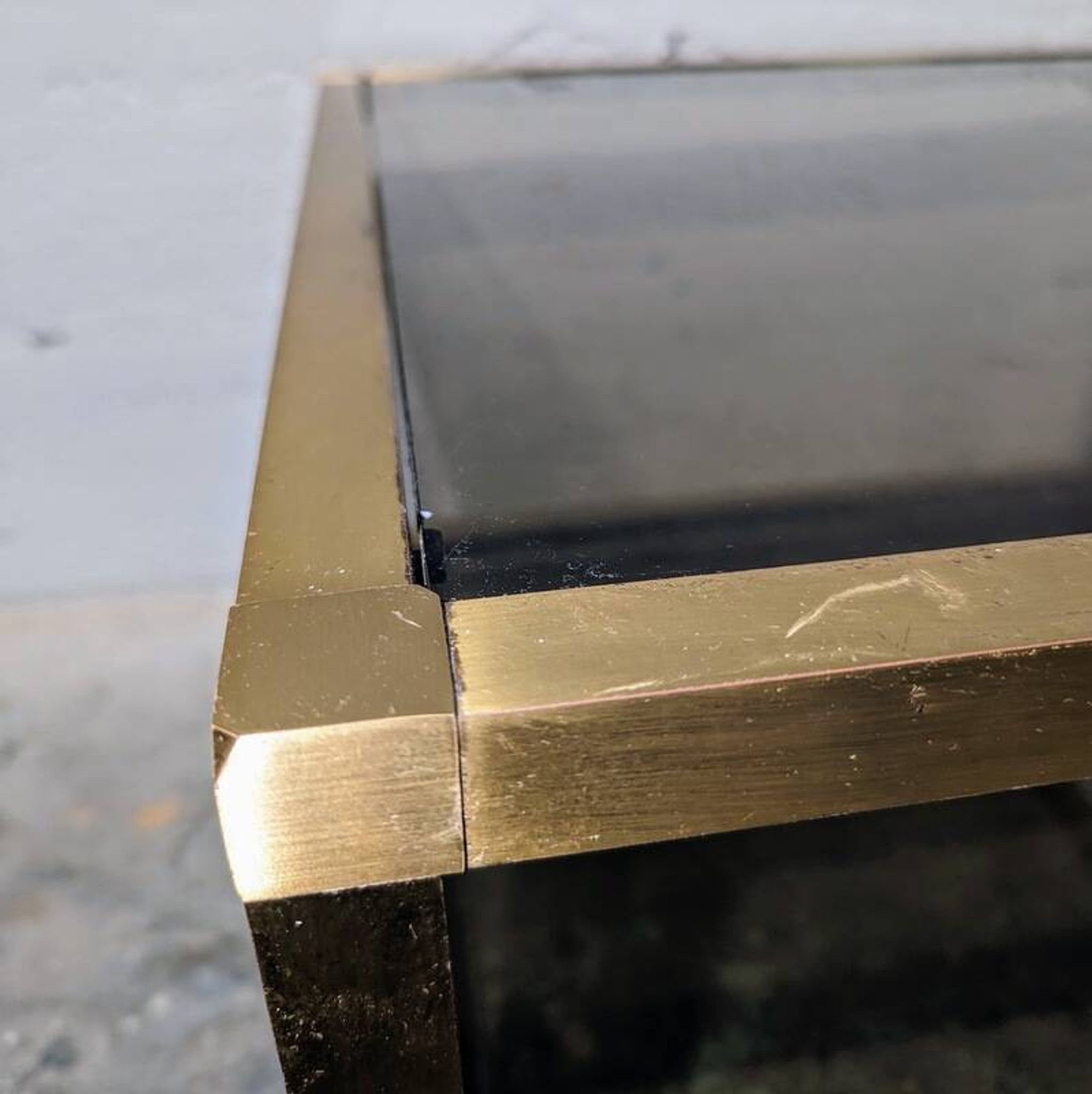 Gold coffee table and smoked glass
