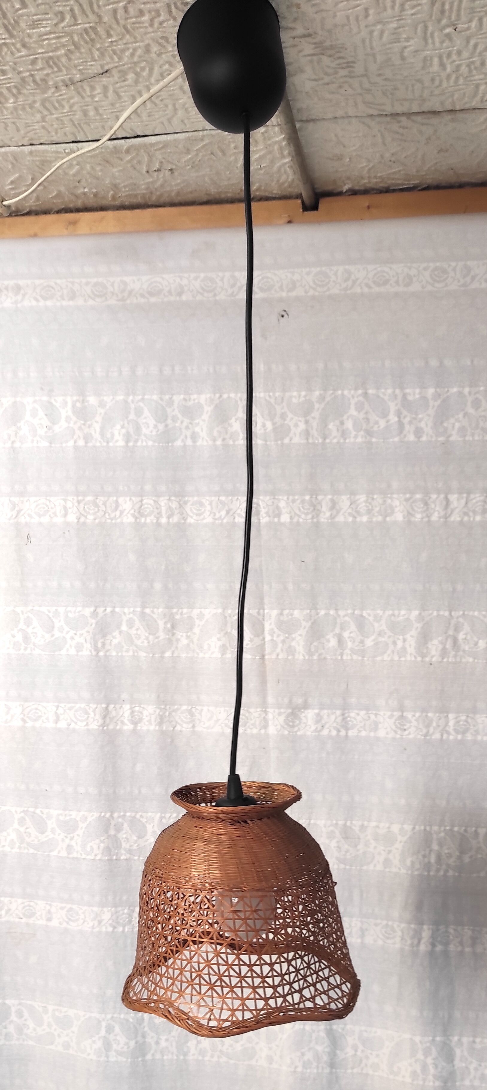 Braided wicker flower suspension