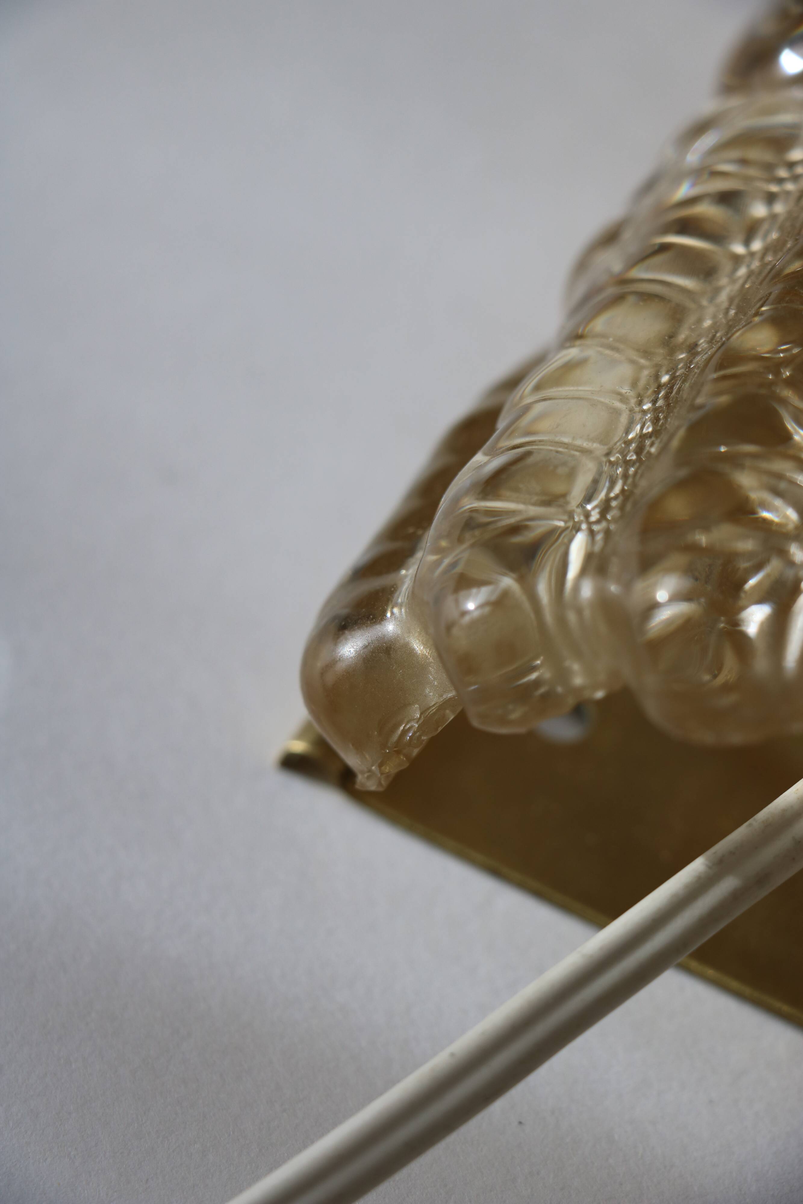 Glass and brass wall light by Carl Fagerlund for Orrefors, 1960.