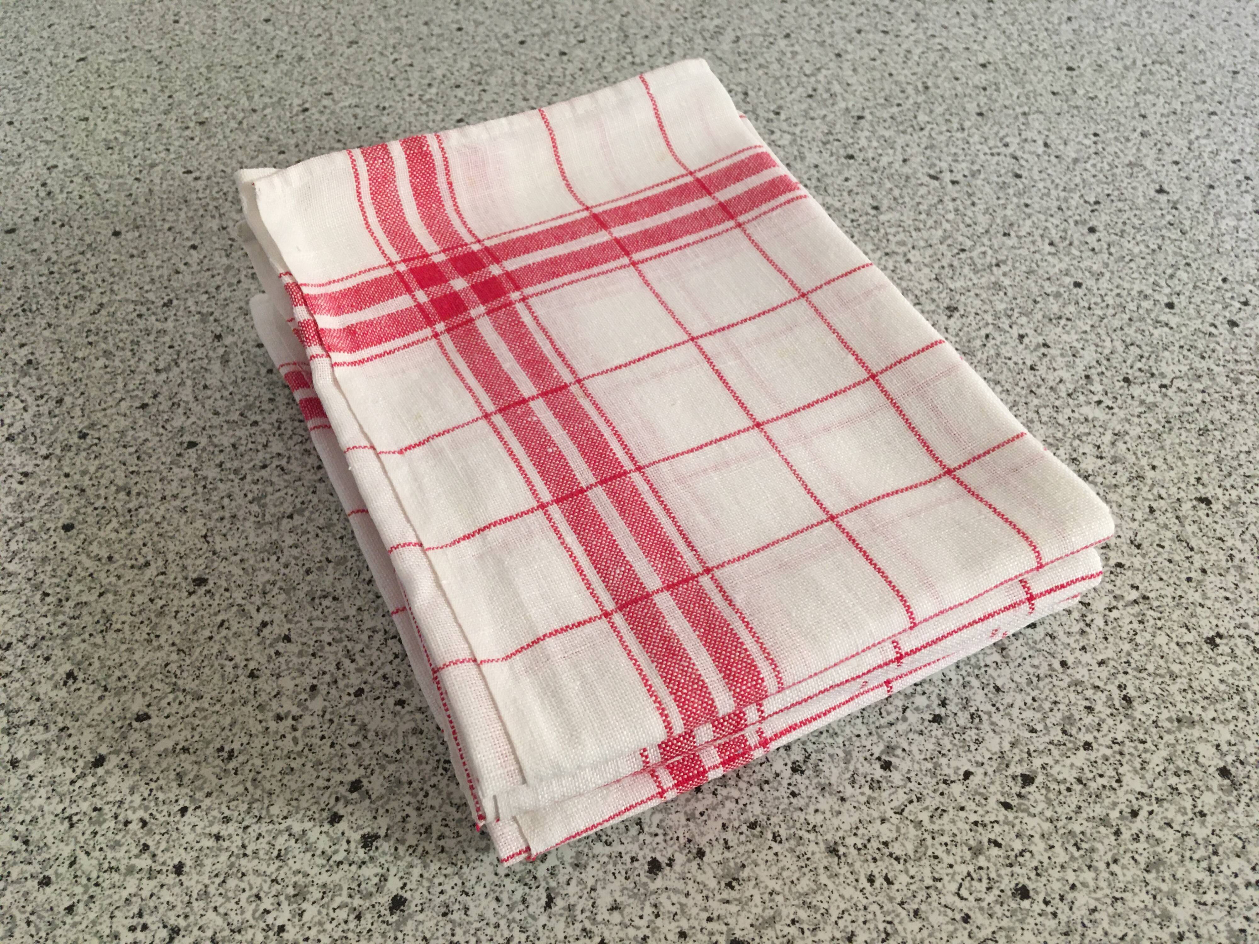 4 red mixed-race tea towels