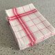 4 red mixed-race tea towels
