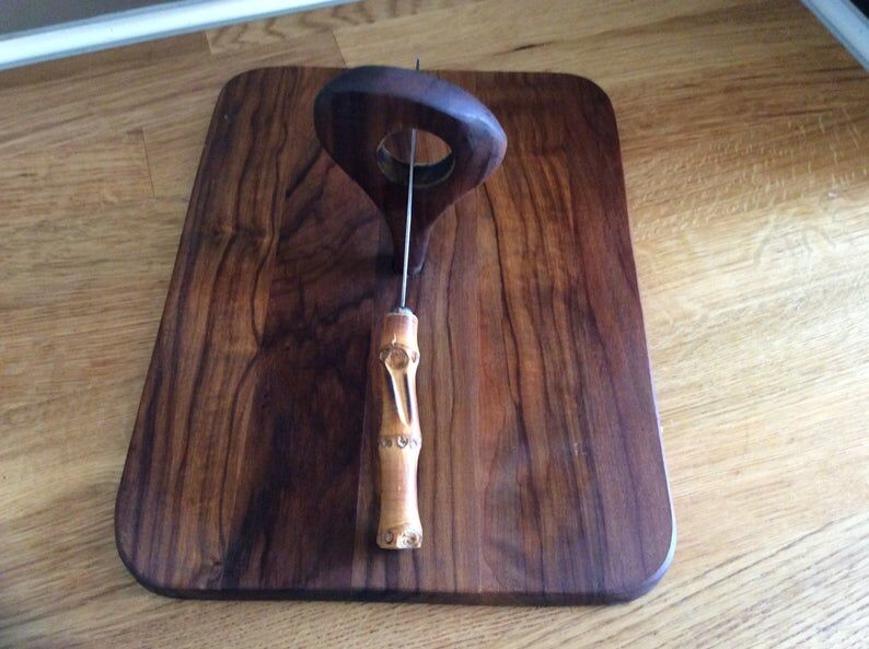 Cheese platter and his knife cutting board kitchen utensils
