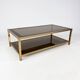 Belgo Chrome coffee table in brass and smoked mirror glass, 1970s.