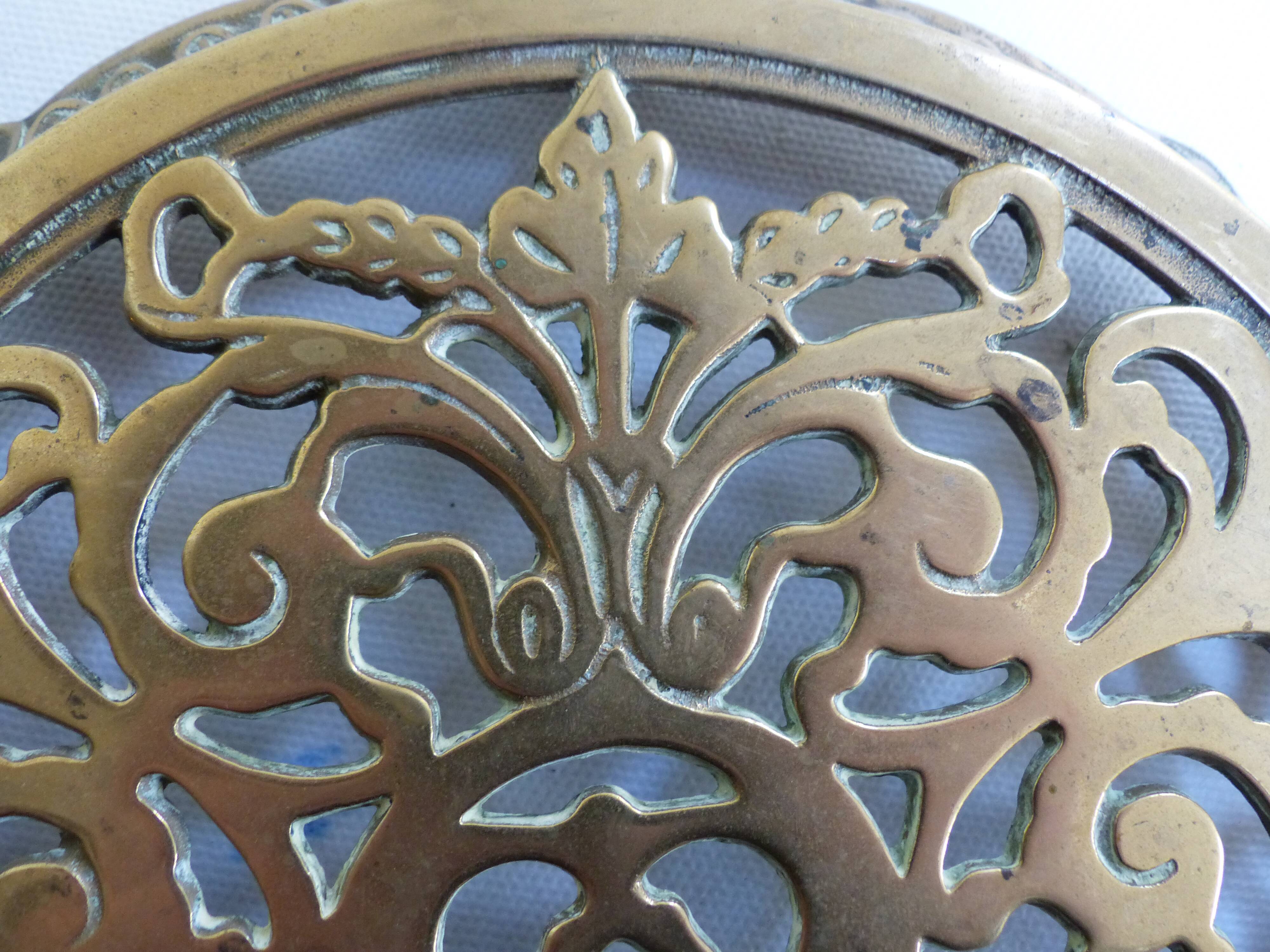Worked copper trivet
