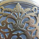 Worked copper trivet