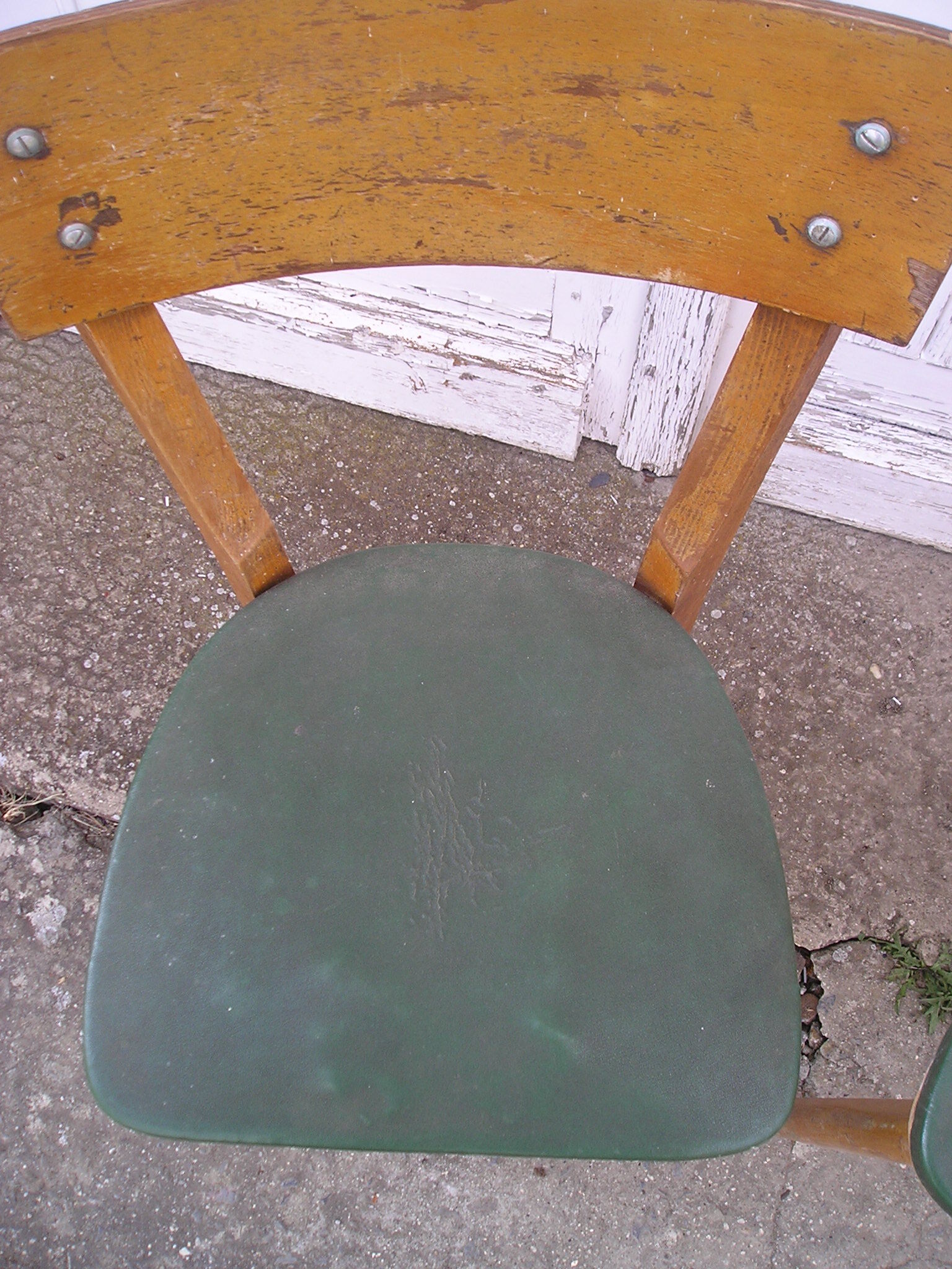 Pair of 1960 chairs, green skai and wood