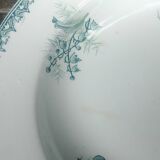 Set of three iron earthenware plates from the St Amandinoise earthenware factory, lily of the valley model.
