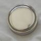Small round silver metal box SNPA.
