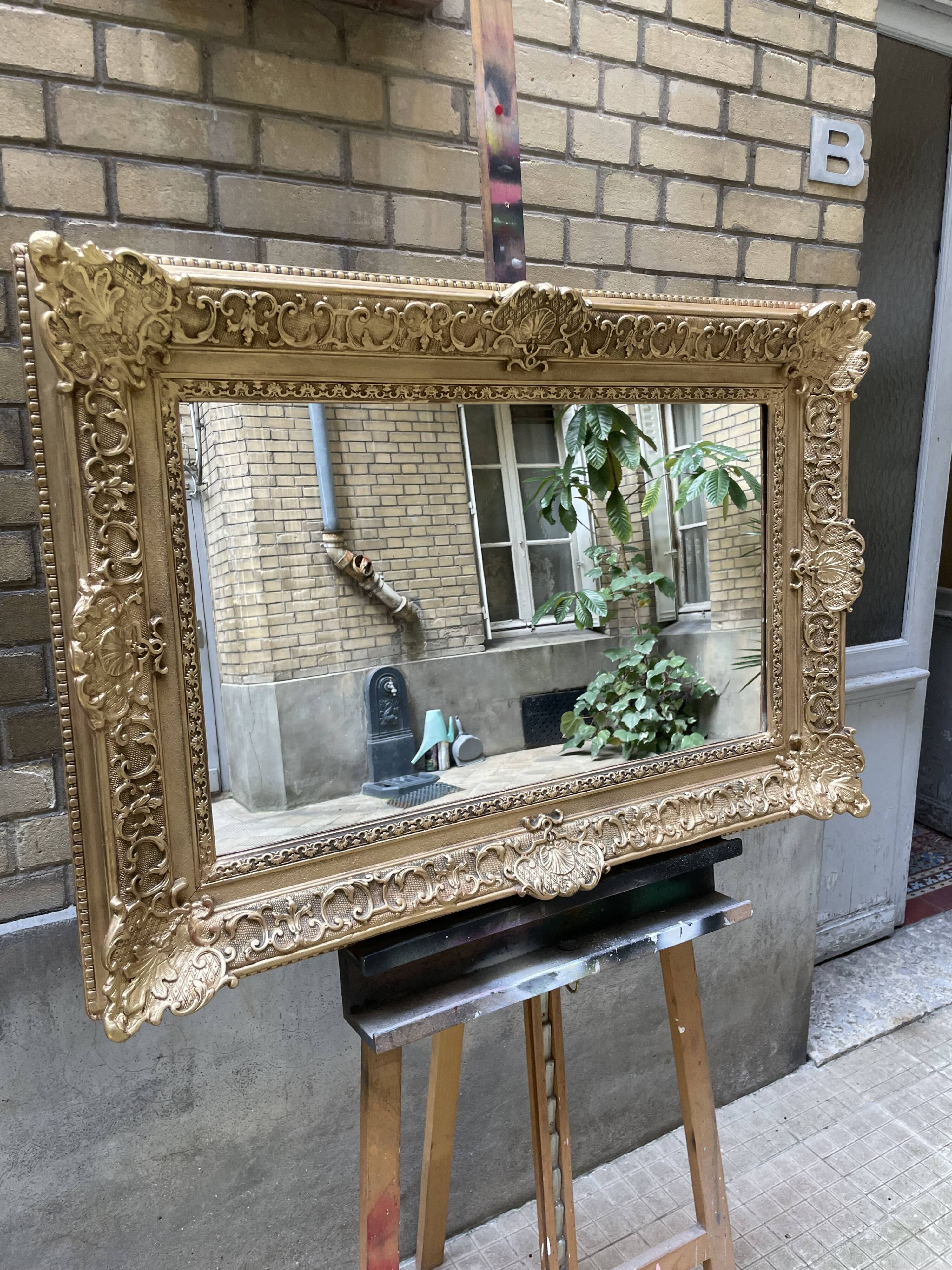 Large gilded Napoleon III mirror – late 19th century – restored, new glass