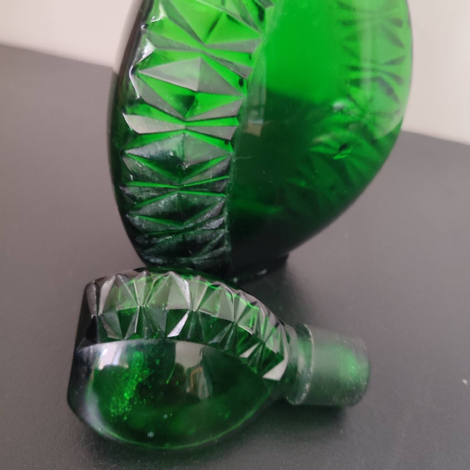 Vintage green carafe in chiseled glass