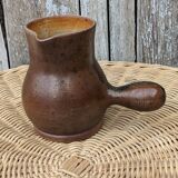 Signed stoneware pitcher