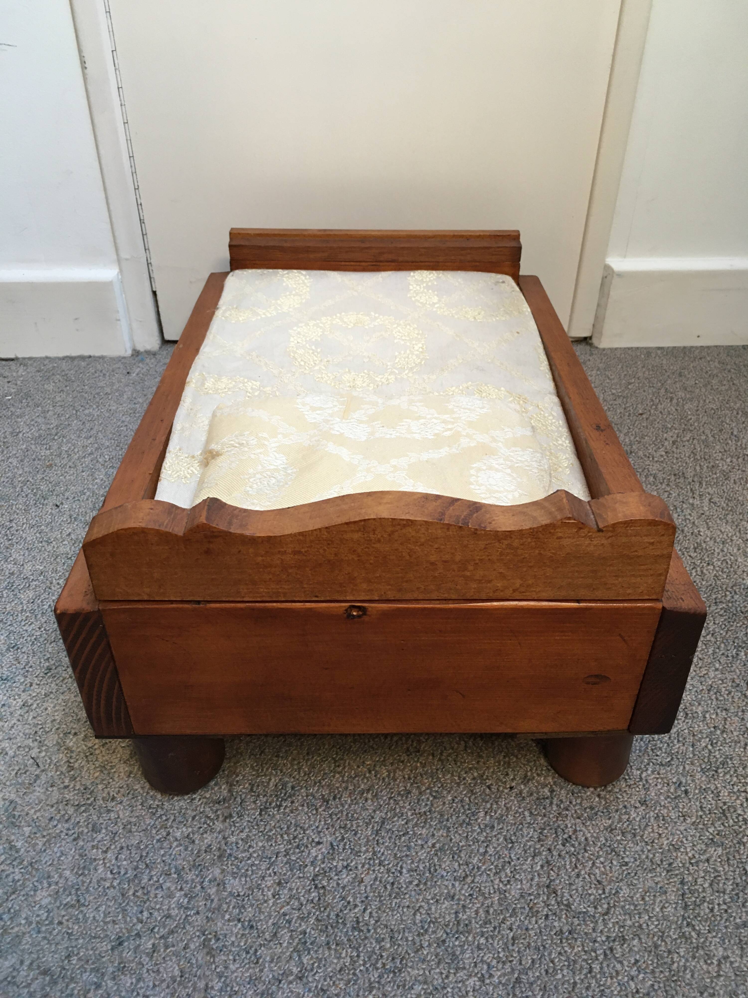 Old wooden bed for doll with mattress and pillow