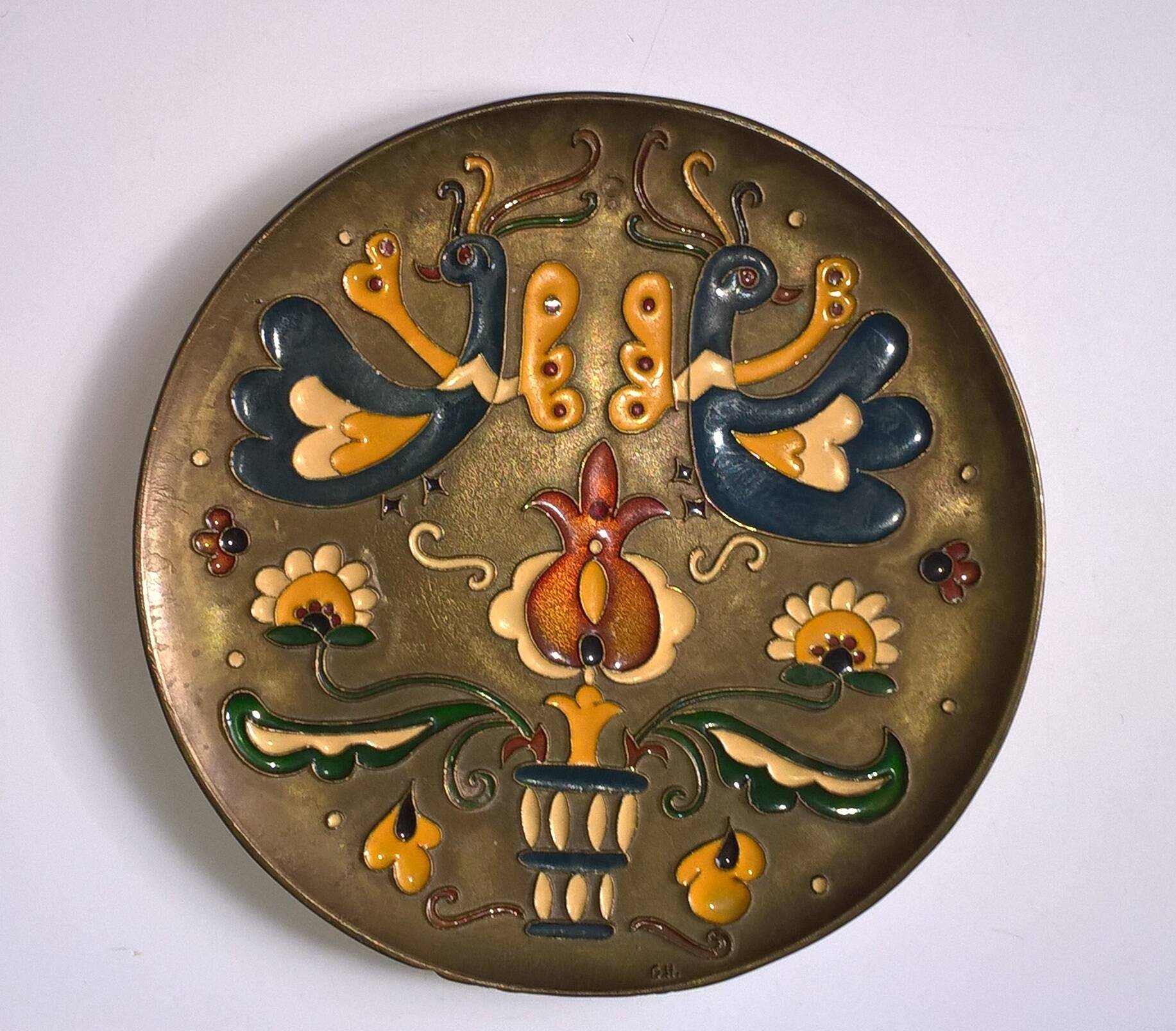Old decorative brass and enamel wall plate signed GH