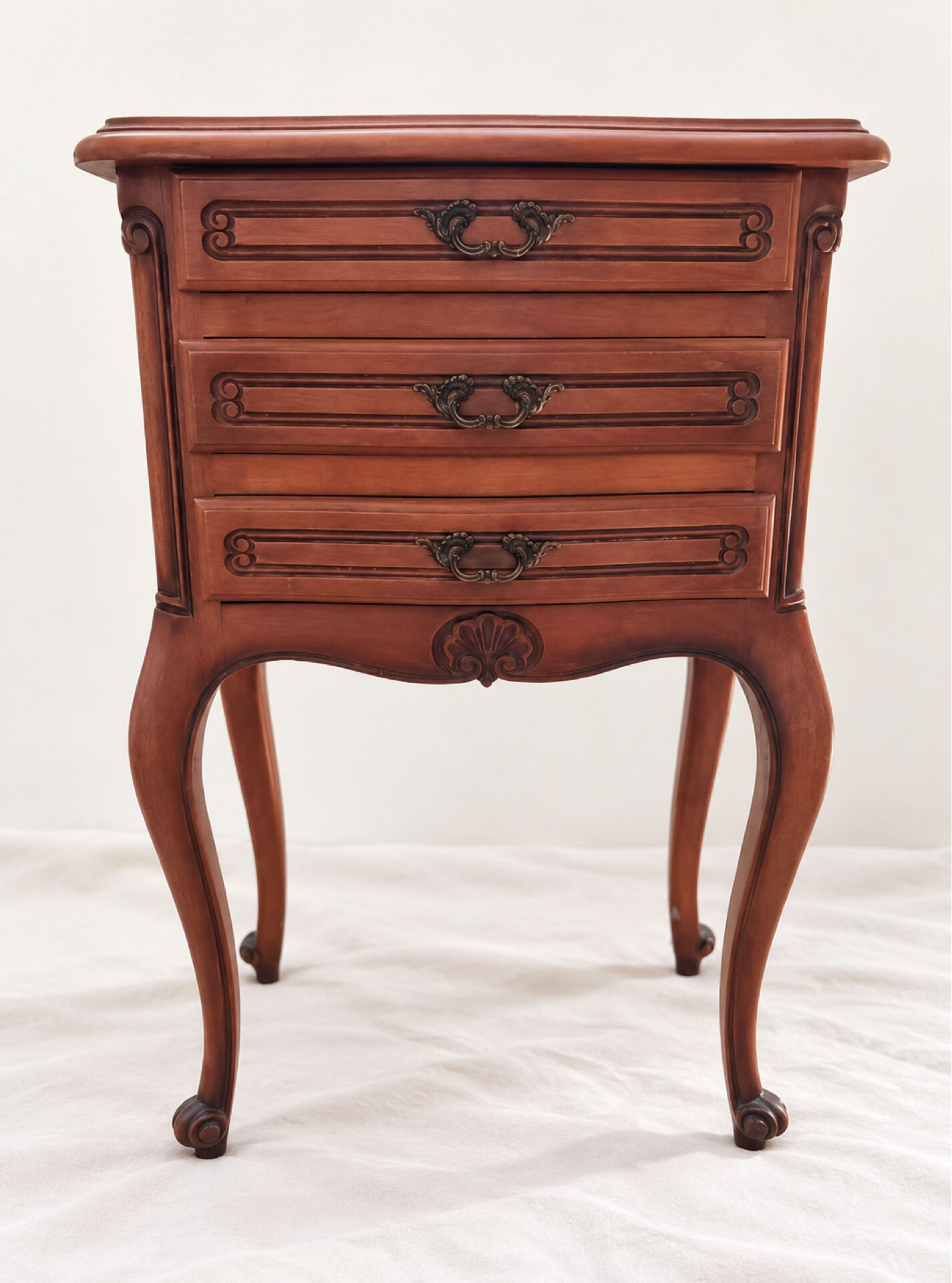 Pair of cherry wood bedside tables in Louis XV style with 3 drawers.