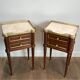 Pair of mahogany and brass side tables or bedside tables with Carrara marble tops.