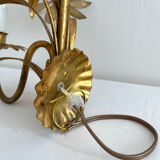 Vintage Hollywood Regency gold metal leaf wall sconce.