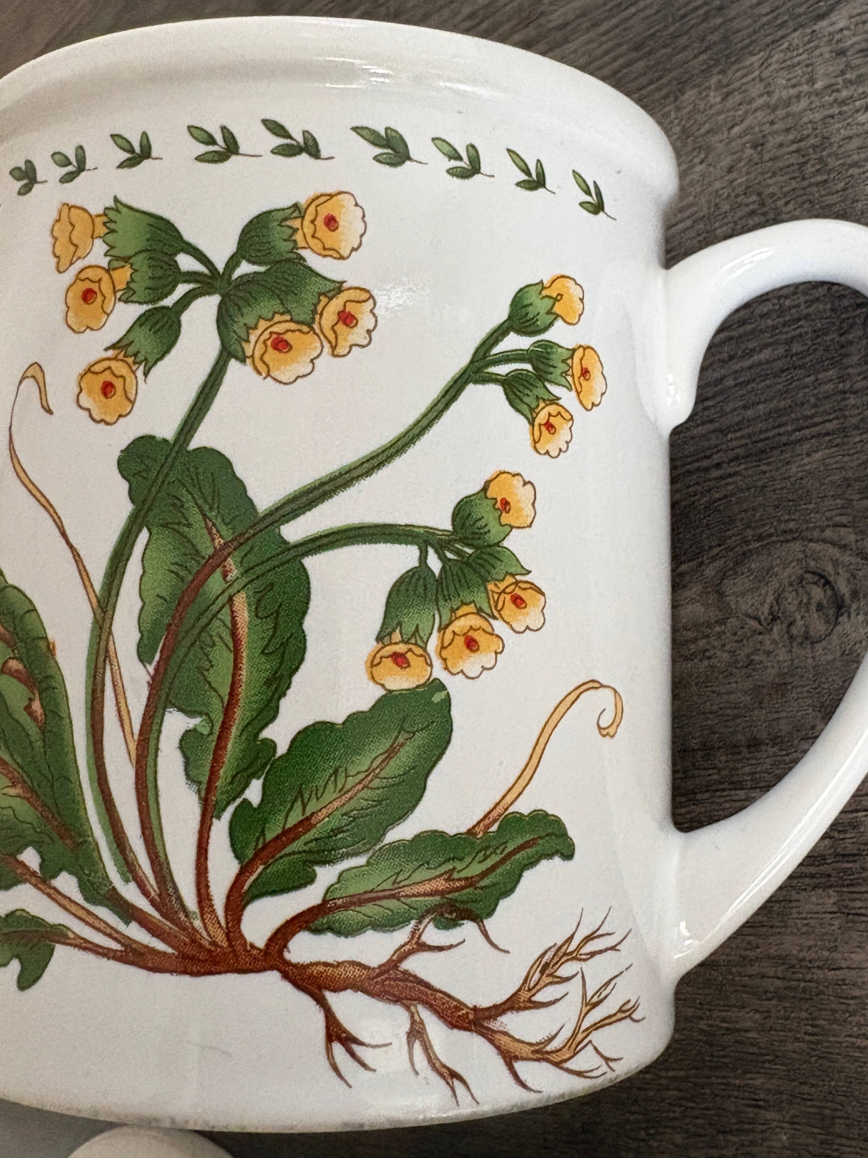 Pair of vintage infusion mugs.