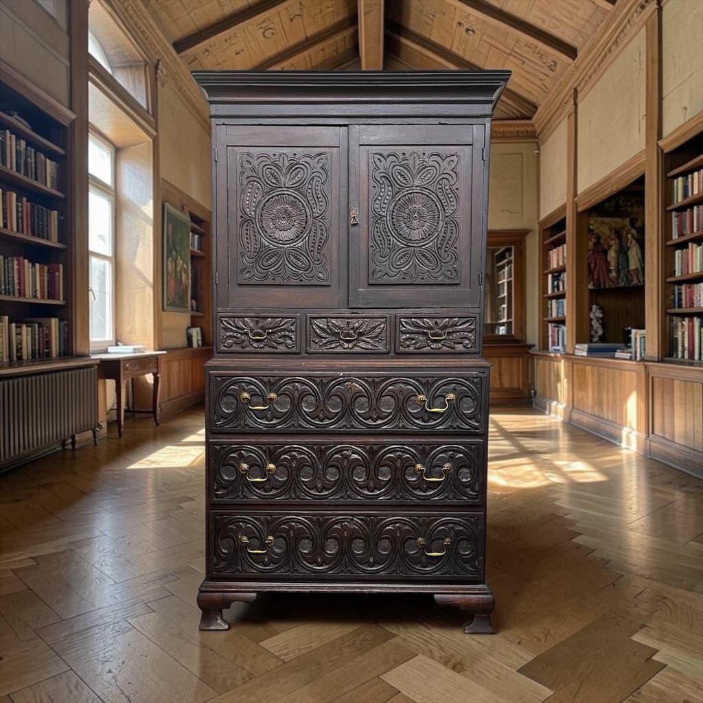 Antique tall wardrobe in dark carved wood / bohemian wardrobe
