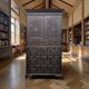 Antique tall wardrobe in dark carved wood / bohemian wardrobe
