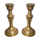 Pair of brass candlesticks with tassels