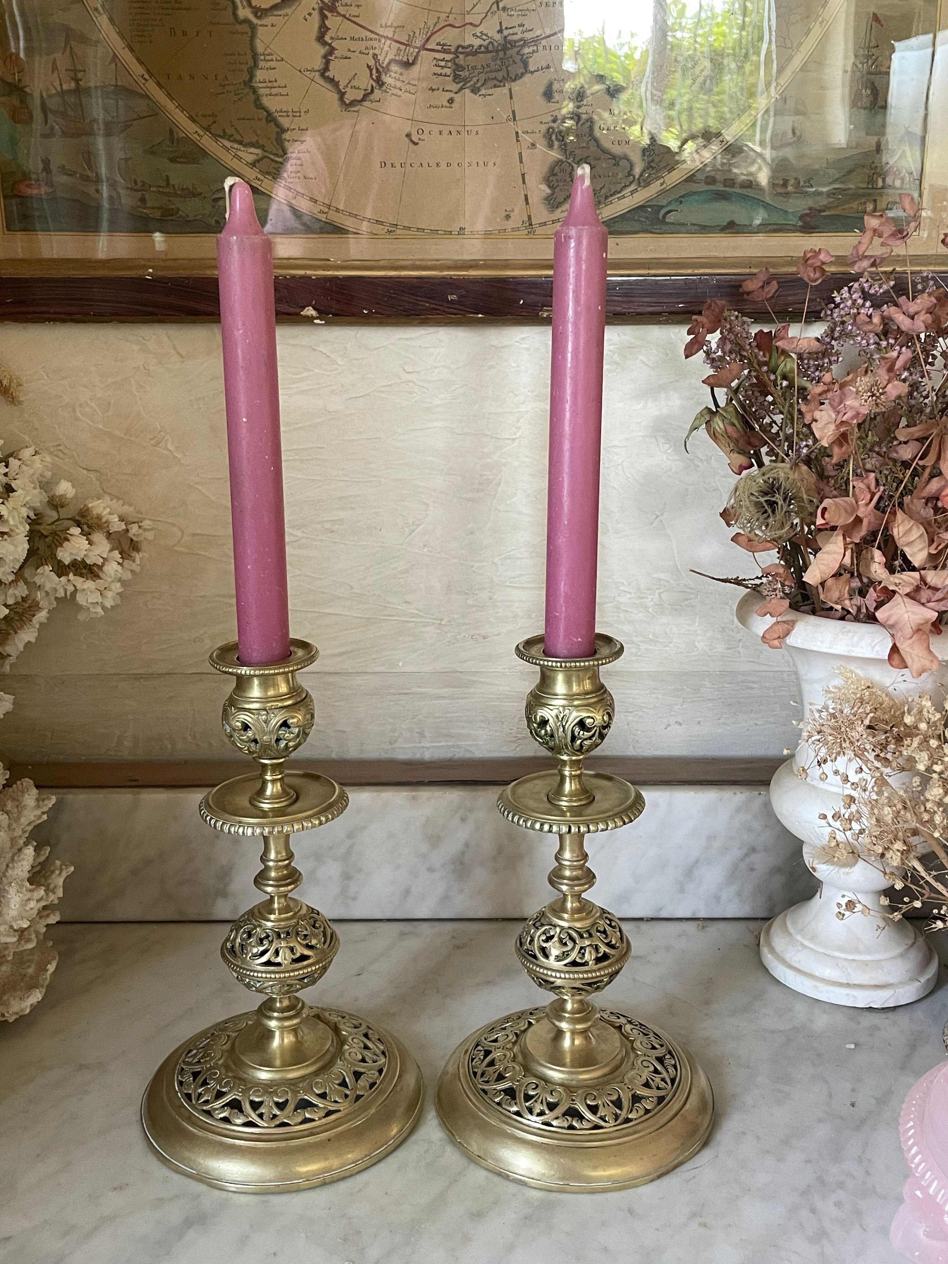 pair of openwork gilded brass candlesticks from the 19th century
