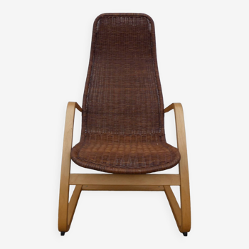 Old vintage rattan sled chair