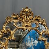 Mirror set with baroque style gilded wood console on marble top.