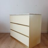 Chest of drawers with travertine