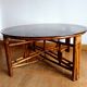 Large telescopic rattan table circa 1970