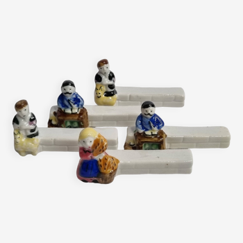 Five porcelain knife holders signed "Le Merzer", 6 cm